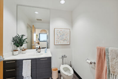 Bathroom with large mirror