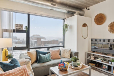 Furnished living space with a large window