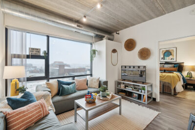 Furnished living space with a large window