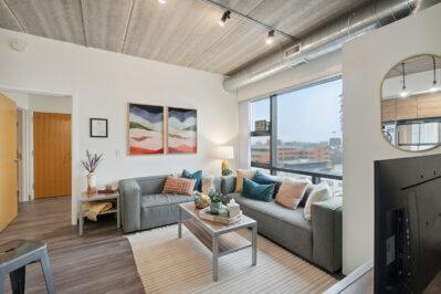 Furnished living space with a large window