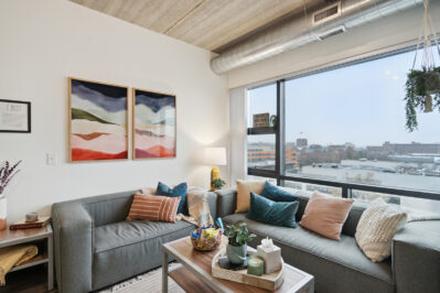 Furnished living space with a large window